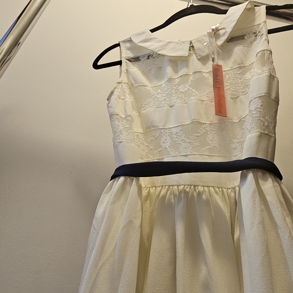 White sheer areas light dress with blue belt